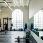 gym mirror wall providing clear reflections in fitness and workout spaces