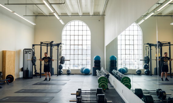 gym mirror wall providing clear reflections in fitness and workout spaces